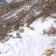Square Snow covering the rocky slope of Provo Canyon mountain during winter in Utah