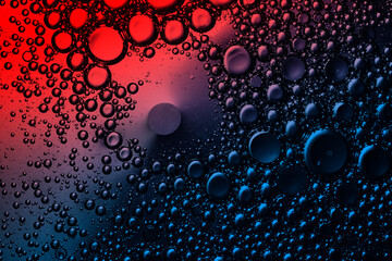 air bubbles in colorful liquid, red and blue background