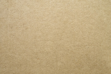 Fototapeta na wymiar Craft Paper Texture. Textured cardboard background. Close-up. Template for design