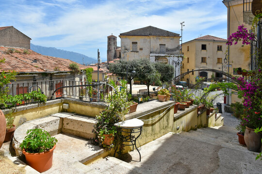 A narrow street between the houses of the medieval town of Eboli in the province of Salerno, Italy.