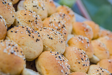 Delicious round bread bites on a plate in a restaurant.