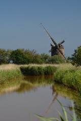 Brograve Mill: an abandoned and dilapidated wind pump on the Norfolk Broads, England, UK.