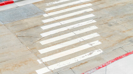 Panorama Pedestrian crossing white lines painted on the road in front of building