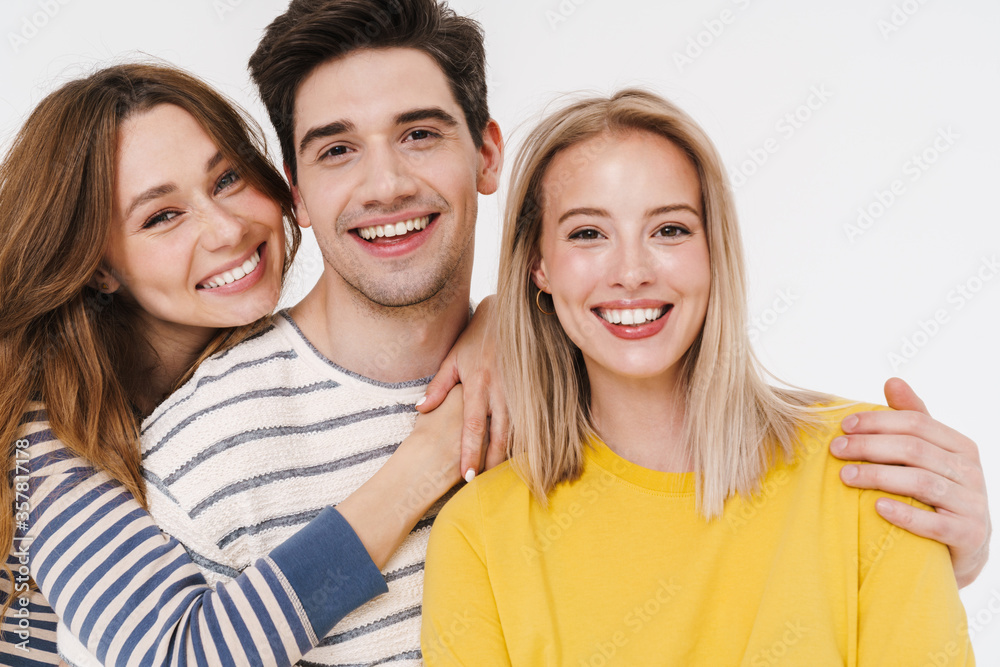 Sticker Image of cheerful man and women hugging and laughing at camera