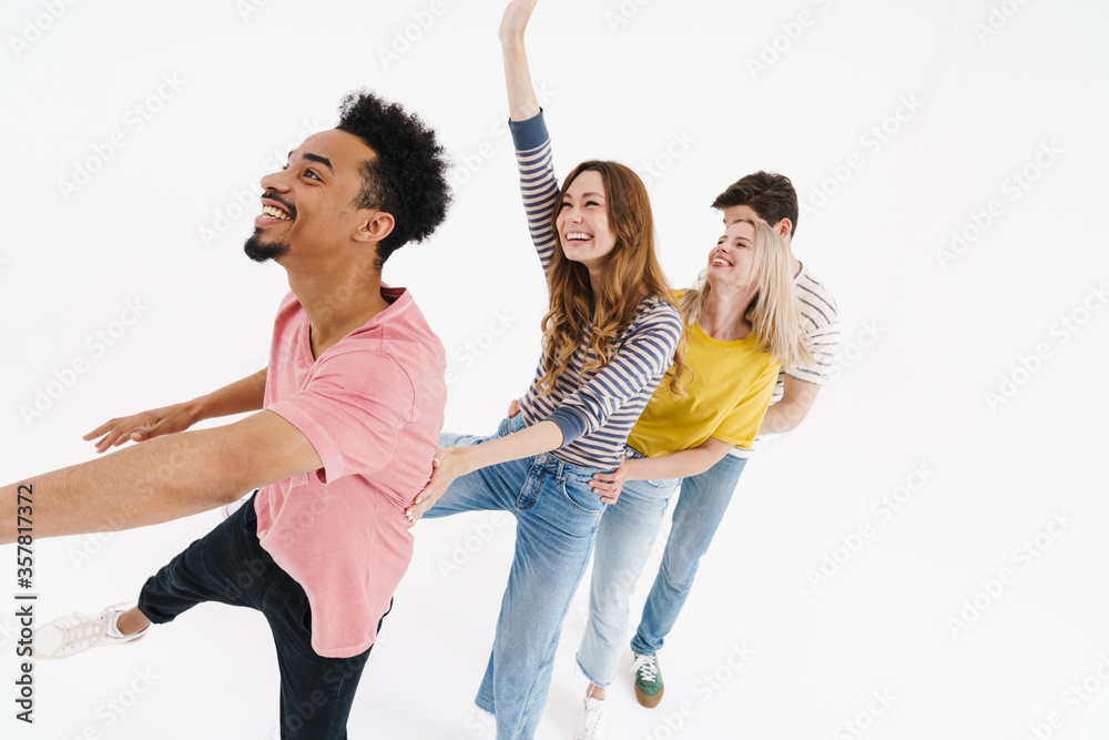 Canvas Prints image of multinational men and women laughing and dancing together