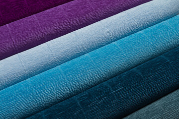 Colorful rolls of crepe paper. Blue gamut.