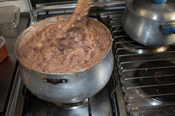 Mozambique african dish known as Chiguinha, made of beans, cassava and powder peanuts