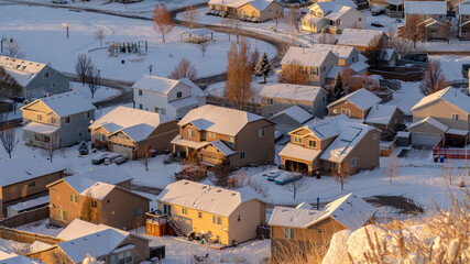 Panorama frame Residential neighborhood in Utah Valley on a scenic snowy aerial view in winter