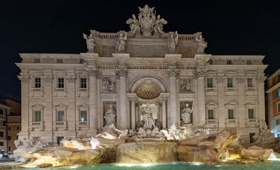 Fototapeta na wymiar Rome Italy, facade of the famous trevi fountain night view illuminated