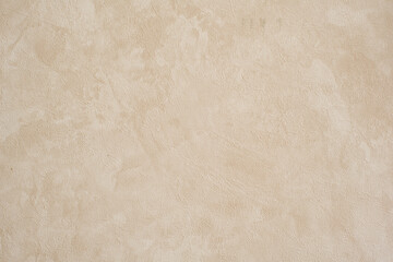 Pimpled background texture of beige color.