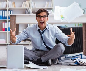 Bankrupt businessman angry in the office floor