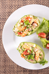 avocado salad with shrimp, cucumber and tomato