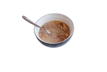 Traditional Turkish dessert ashure or Noah's Pudding isolated on white.