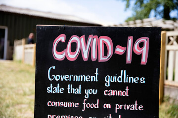 Fototapeta premium A coronavirus covid-19 government guidlines warning sign.