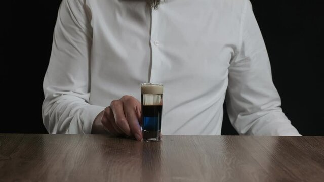 Lexus Cocktail - blue curacao liquor, coffee liquor, sambuca and irish cream