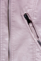 Pink Leather Background. Pink leather background with zipper from the lock. Structured background design leather.