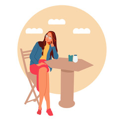 Beautiful girl is resting in the street cafe. Summer rest, relaxation.