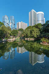 Fototapeta na wymiar high rise office building and public park in central district of Hong Kong city