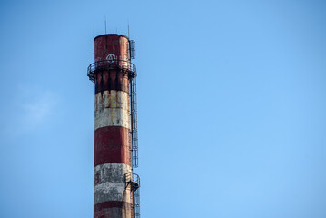 Industrial brick pipes and a large space with the sky
