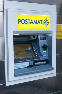 A Postamat cash machine (ATM machine) outiside a postal office in Italy