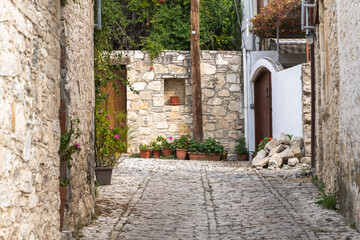 Fototapeta na wymiar Narrow street in tourist ancient village of Lania, Cyprus