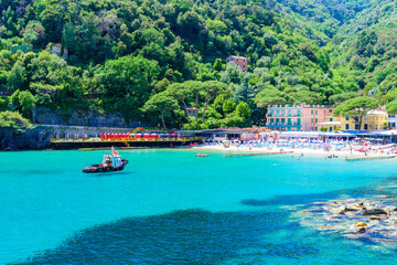 Bay of Paraggi in Santa Margherita Ligure with paradise white beach, close to Portofino. Mediterranean sea of Italy.