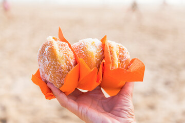 Berlin Balls: Portuguese fried dough covered in sugar, typical dessert