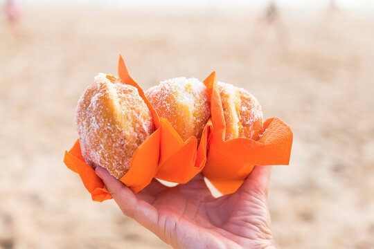 Berlin Balls: Portuguese fried dough covered in sugar, typical dessert