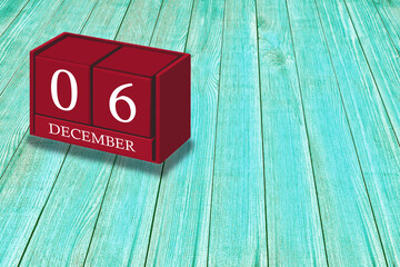 December 6th, Day 06 of December month, Red calendar on workplace green wood, Empty space for text, Copy space right, 3D illustration