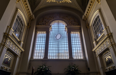 LONDON, UK - APR 19, 2019 : Leaded glass window at St. Martin in the fields church at the north-east corner of Trafalgar Square.