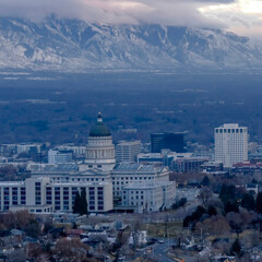 Square Downtown Salt Lake City with amazing view of steep snowy mountain in winter