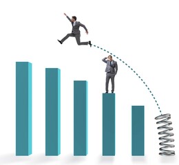 Businessman outperforming his competition jumping over