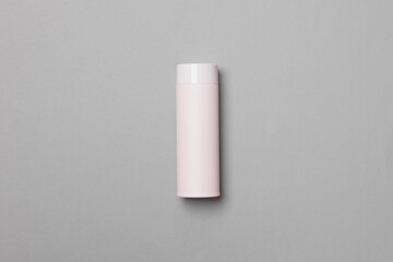 pink thermos cup on grey background