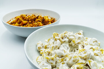 Tortelllini alla panna and Tortellini al ragu. Traditional italian pasta