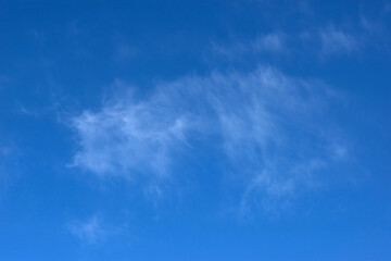 Air clouds in the blue sky. Nature background