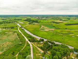 Biebrza Podlasie Biebrzański Park Narodowy Rzeka trzcina wieś pole łąka widok z drona - obrazy, fototapety, plakaty