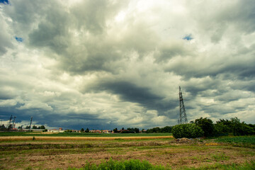country landscape dominated by thunderstorm clouds