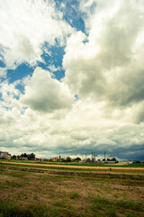 country landscape dominated by thunderstorm clouds