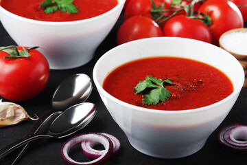 Two plates with gazpacho - traditional Spanish tomato soup
