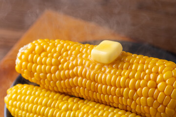 Melted butter on sweet corn.