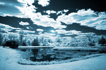 Infrared photos of Ontario rural parkland settings with split rail fence, oak trees, clouds and lake reflections.