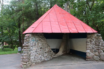 magic bus station with roof in forest