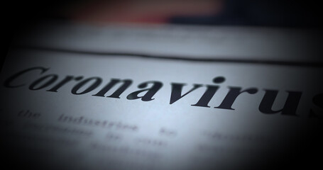Close up shot of a newspaper title of Covid-19 coronavirus pandemic