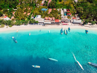 Tropical island with paradise beach and turquoise sea. Aerial view of Gili Meno