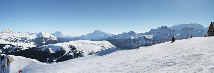 Panoramic winter view of Alpine mountains. Dolimites. Sella Ronda. Alta Badia. South Tirol. Italy.