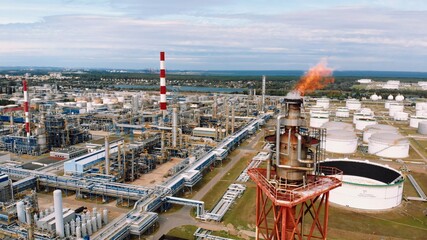 Burning Oil Chimney - Industrial smoke global warming emissions Oil Rafinery Gdansk Poland. High...