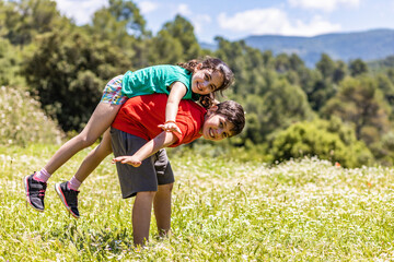 Fototapeta premium Kids having fun on a field