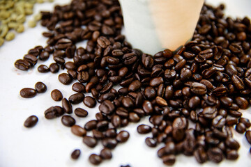 Fresh roasted coffee beans on white background