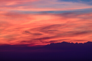 Red sky and clouds at sunset in the evening 