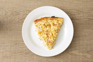 Food plate of pizza. Dish showing italian typical recipe. On rustic wooden table.